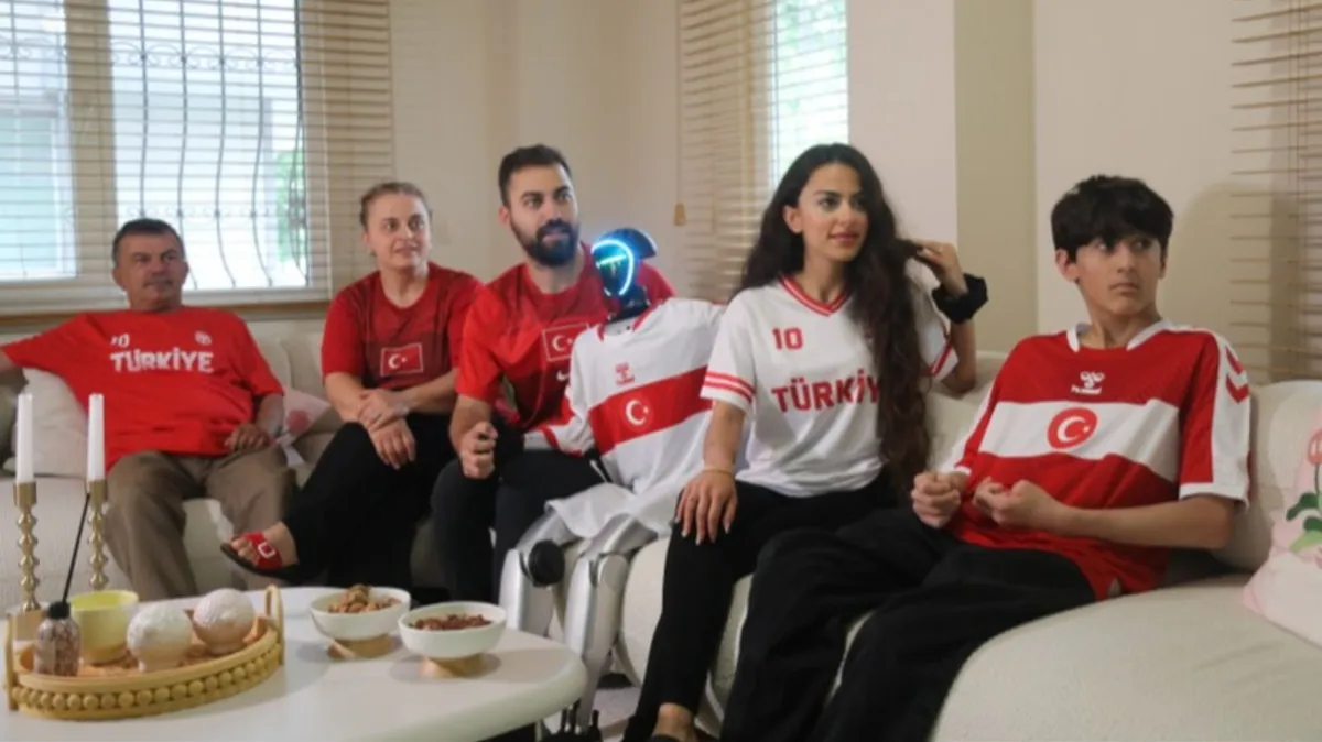 A Milli Takım'ın maçını robot CANİKMAN ile izlediler